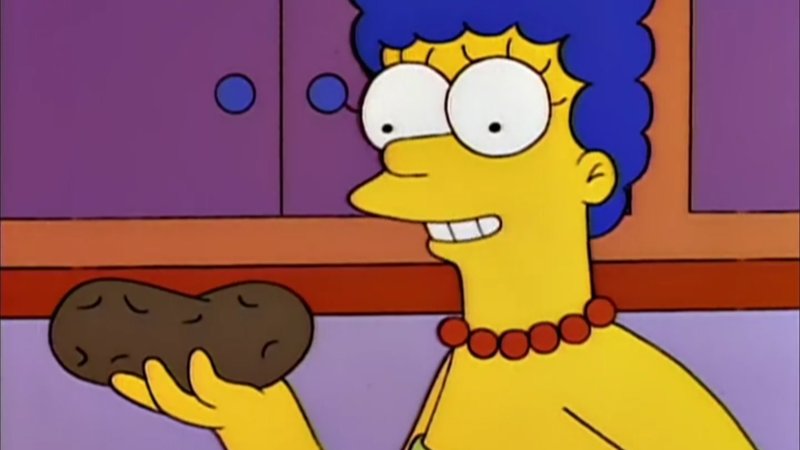 Marge Simpson holding a potato